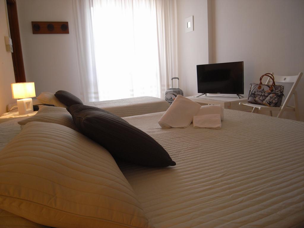 Hotel Moreri Grado Habitación foto