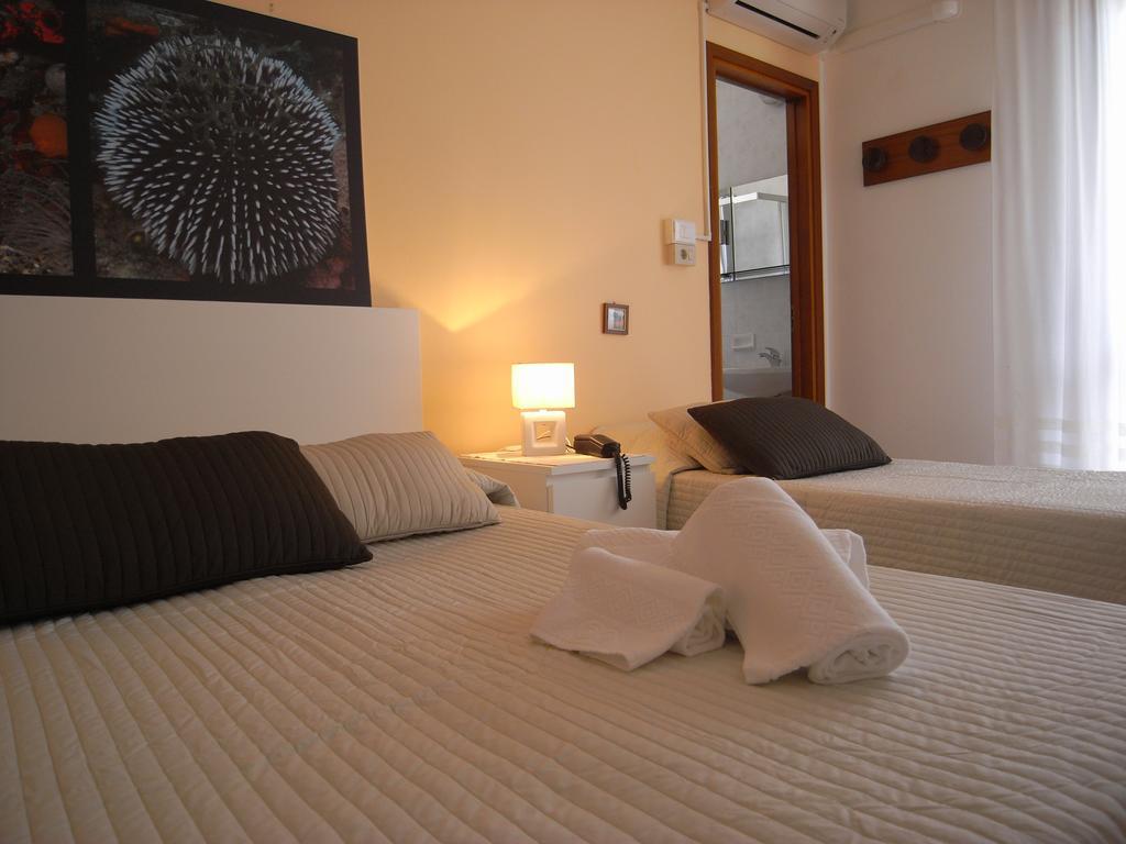 Hotel Moreri Grado Habitación foto